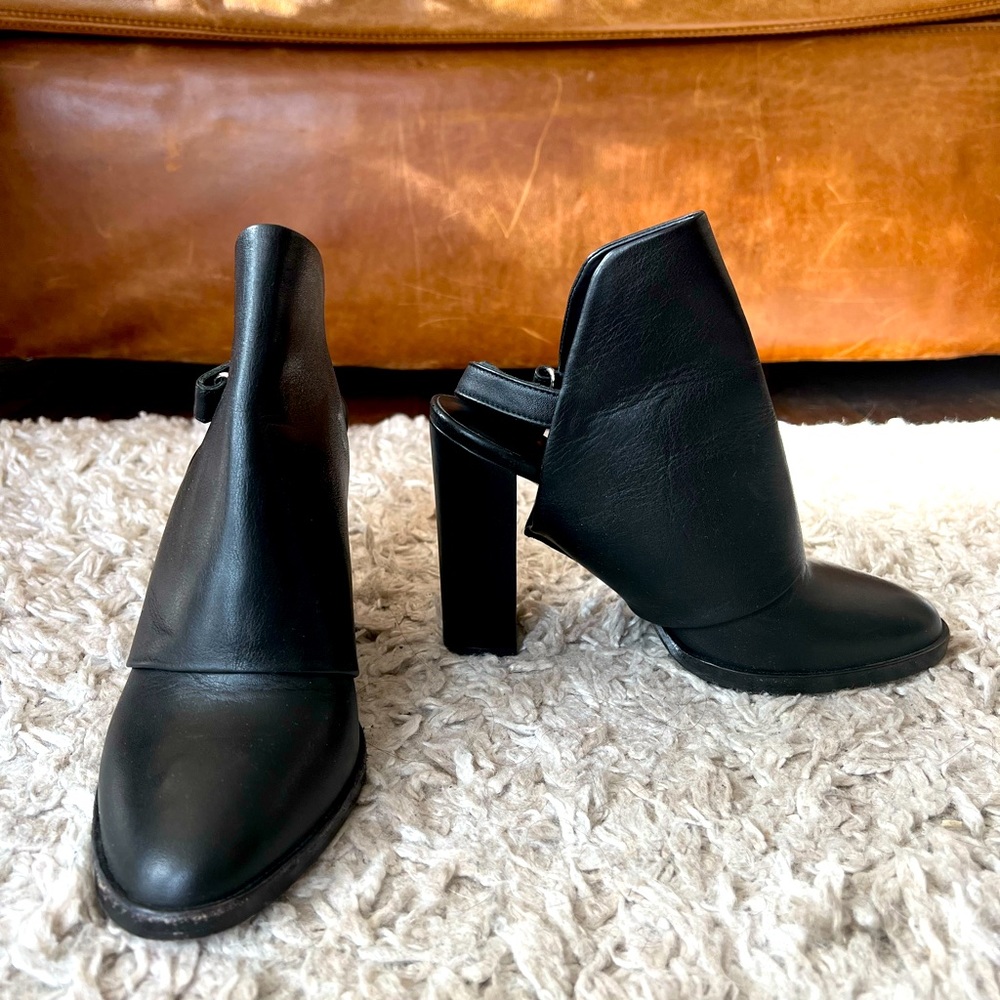 Vince black boots 7.5M